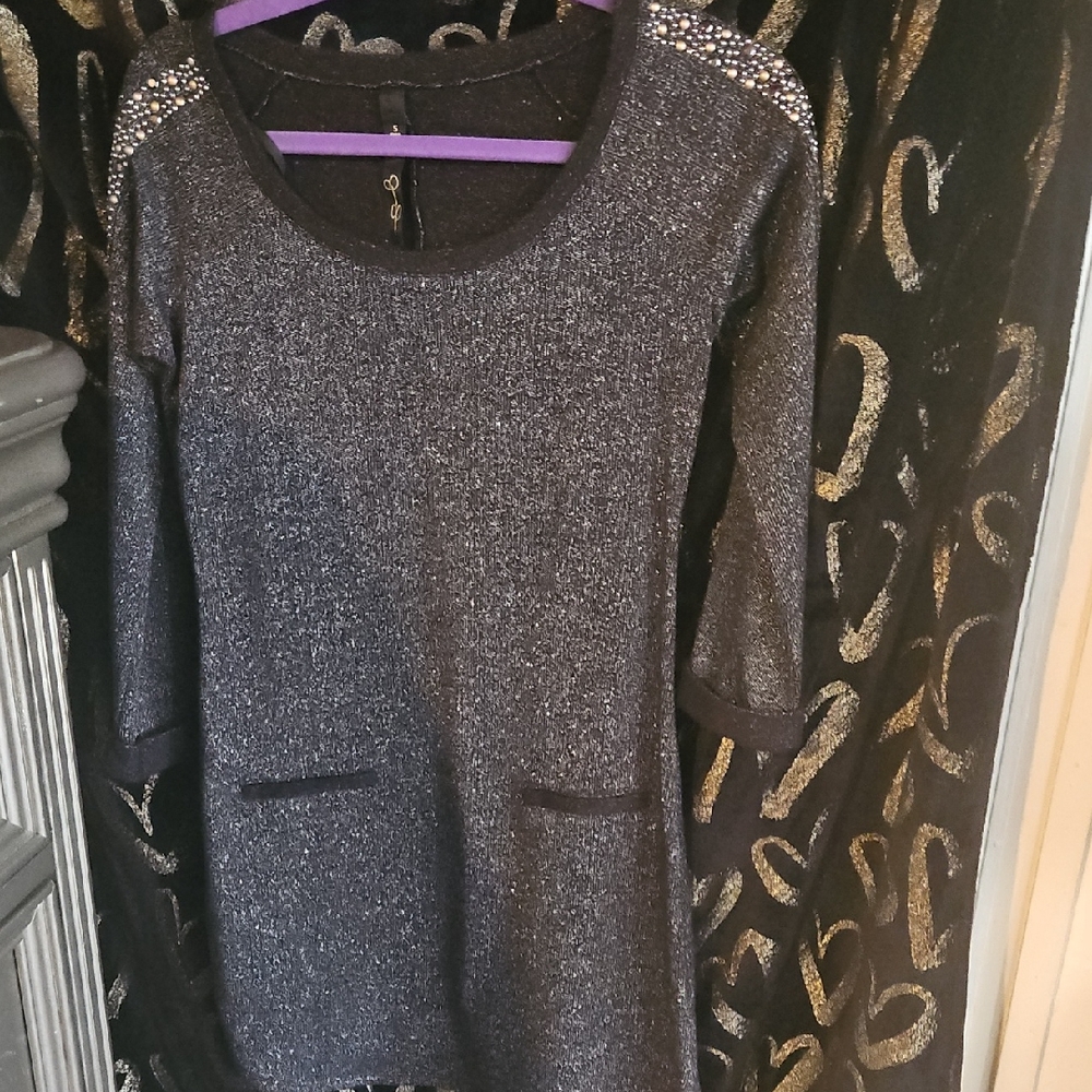 Elegant Black Dress with Embellished Shoulders
